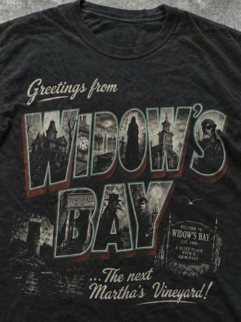 Greetings From Widow's Bay Black Graphic Tee